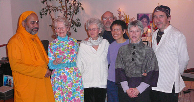 Church of Truth contributes to Haitian Orphanage: Swami Dayamrita Chaitanya receives $200 cheque from Patti Huot while othe Church of Truth members look on:Cedona Holly, PaulMonfette, Linda Chan, Lorna Rennie and Yves Viel.